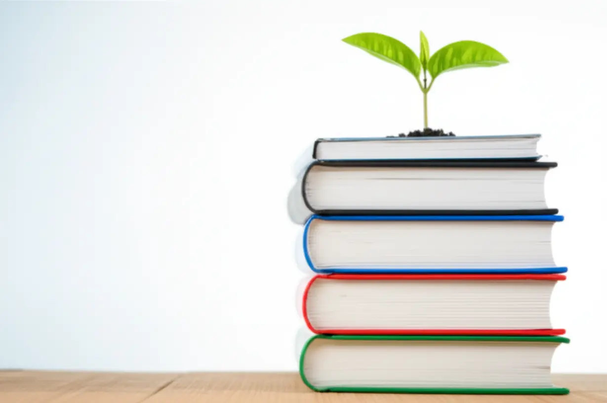 A-cute-3D-rendering-of-stacked-English-learning-books-with-a-plant-sprout-growing-from-them,-symbolizing-the-growth-that-comes-from-developing-a-learning-habit.