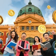 Students-celebrating-saving-money-on-study-abroad-in-front-of-a-Melbourne-landmark