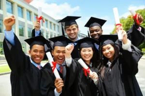 A-diverse-group-of-joyful-graduates-holding-diplomas-in-front-of-a-university,-symbolizing-academic-achievement-and-future-success.